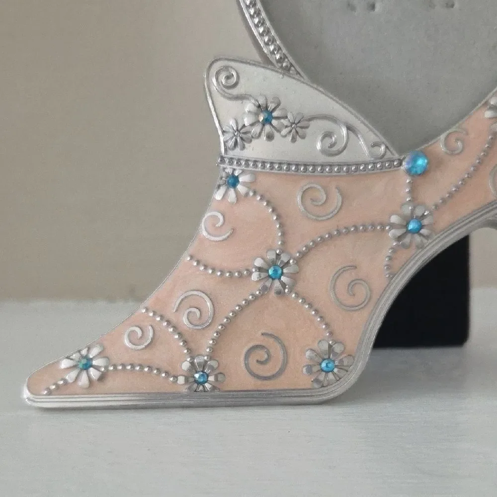 Elegant Silver and Cream Decorative Shoe Frame